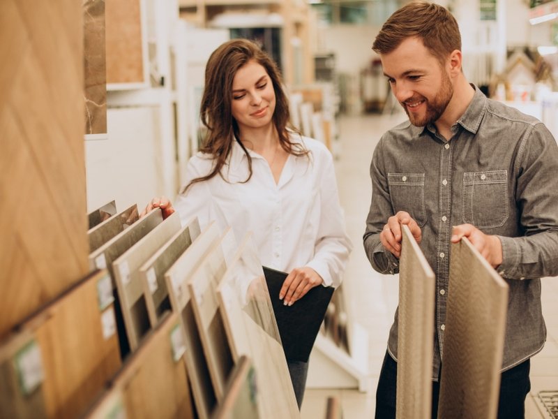 Customers shopping in a Flooring Show Room in {{ location }}